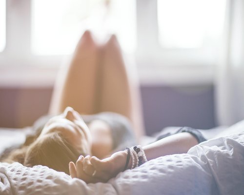 Cozy bedroom setting with soft morning light